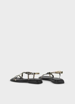 IZZY SANDALEN
